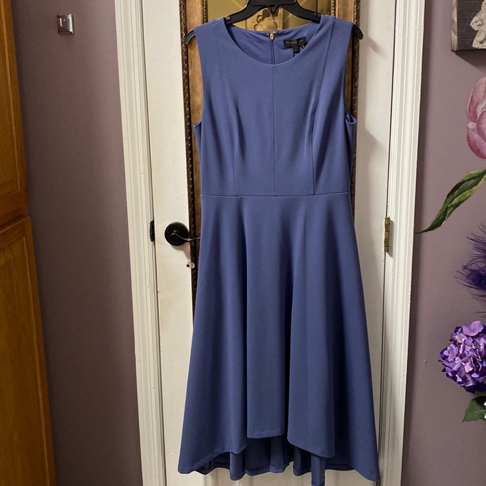 Sleeveless periwinkle long dress high in front low in back. Gold zipper